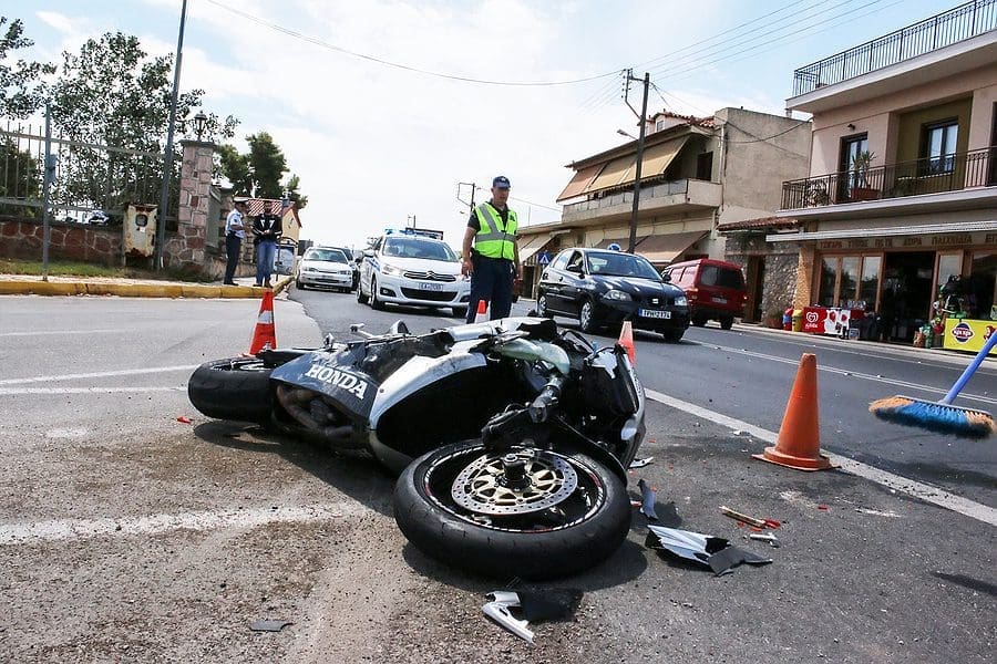 Traffic Accident Between A Car And A Motorcycle