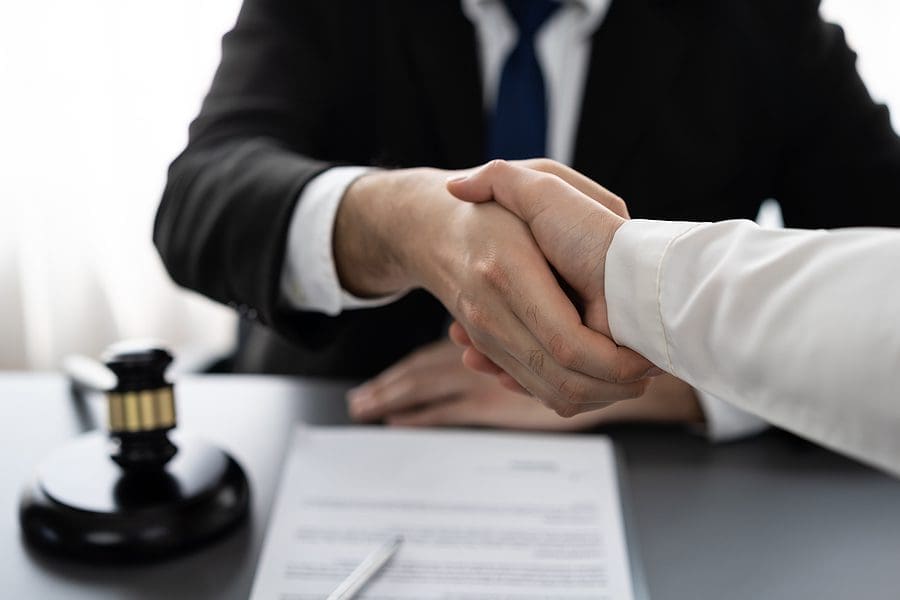 Closeup Lawyer Or Attorneys Colleagues Handshake