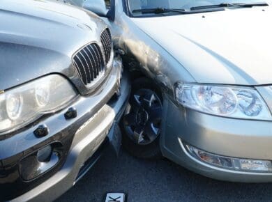 Broken rumpled dangerous car models after a severe accident with a skewed body, after a powerful blow.