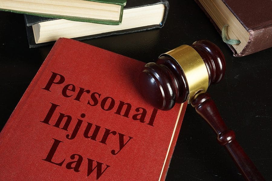 A book related to personal injury laws with the judge's hammer