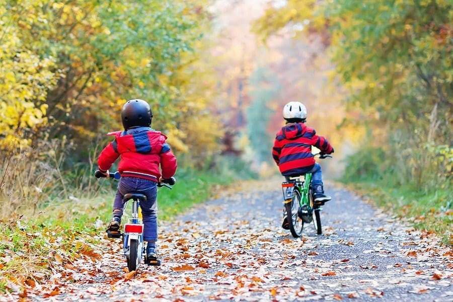 Kids riding bicycle in park