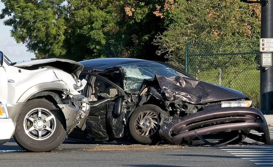 two cars smashed together in a Magnolia Heights car accident