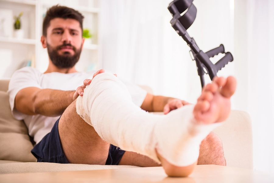 madeira beach man with his leg in a cast at home after a personal injury accident