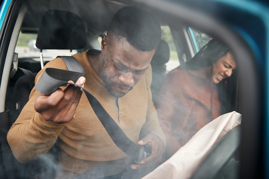 young black couple in their car after a broadwater personal injury accident