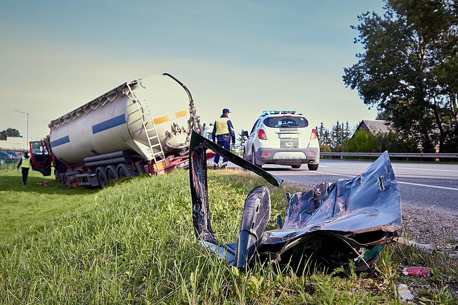 madeira beach truck accident where the truck has gone off the road and a car is damaged